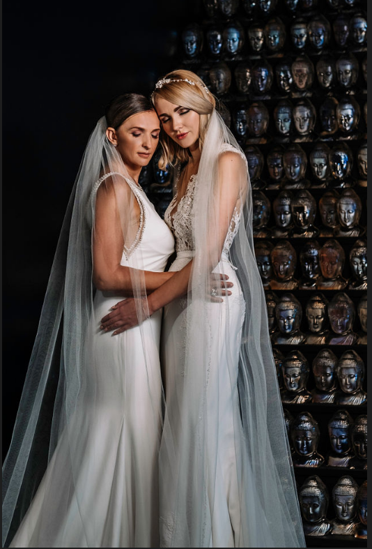 Hers and Hers Wedding Gowns Image